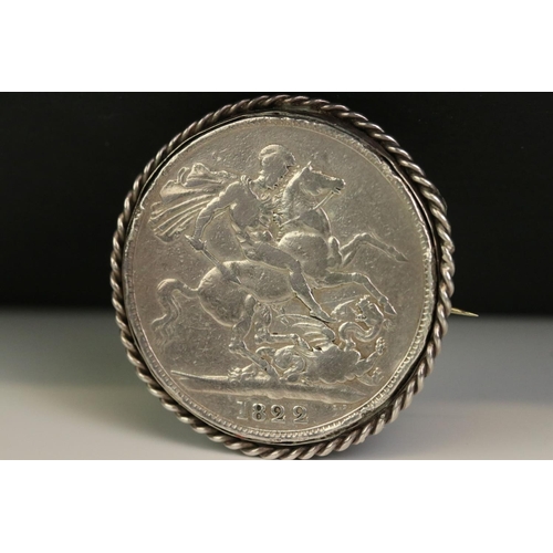 31 - Two King George III silver full crown coins to include a 1820 and an 1822 example mounted as a brooc... 