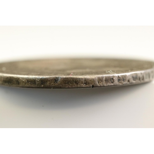 31 - Two King George III silver full crown coins to include a 1820 and an 1822 example mounted as a brooc... 