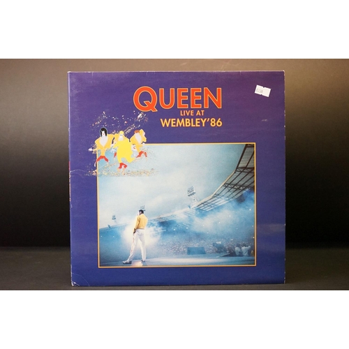 19 - Vinyl - Queen Live At Wembley '86 double LP (Parlophone – PCSP 725).  Gatefold sleeve has corner fol... 