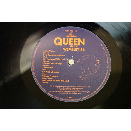 19 - Vinyl - Queen Live At Wembley '86 double LP (Parlophone – PCSP 725).  Gatefold sleeve has corner fol... 