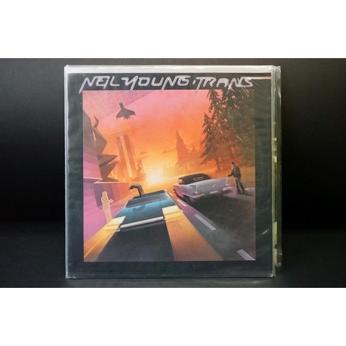 149 - Vinyl - 14 Neil Young LPs spanning his career to include original pressings and reissues.  Condition... 