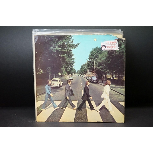 328 - Vinyl - Over 25 The Beatles LPs spanning their career, including some duplication. Condition varies ... 