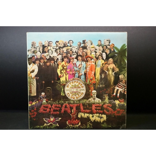 167 - Vinyl - 14 The Beatles LPs featuring early & foreign pressings to include Sgt Pepper x 4 including o... 