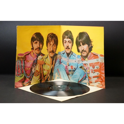 167 - Vinyl - 14 The Beatles LPs featuring early & foreign pressings to include Sgt Pepper x 4 including o... 