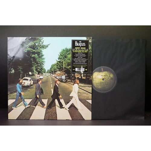 514 - Vinyl - 3 Beatles LPs to include Abbey Road stereo remaster on 180gm vinyl in NM condition, Live At ... 