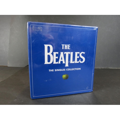 764 - Vinyl - The Beatles Single Collection box set (Apple/UMG 0602547261717) 2019 release.  Sealed