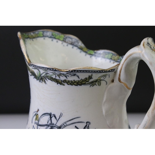 36 - 19th Century ceramic cider jug with transfer printed and hand-coloured decoration to include farming... 