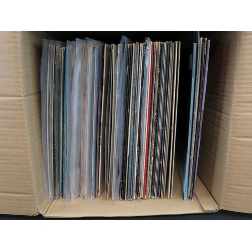 297 - Vinyl - Over 50 rock LPs including Rainbow, ZZ Top, Hawkwind, Rush, Kiss, Blue Oyster Cult, Krokus, ... 