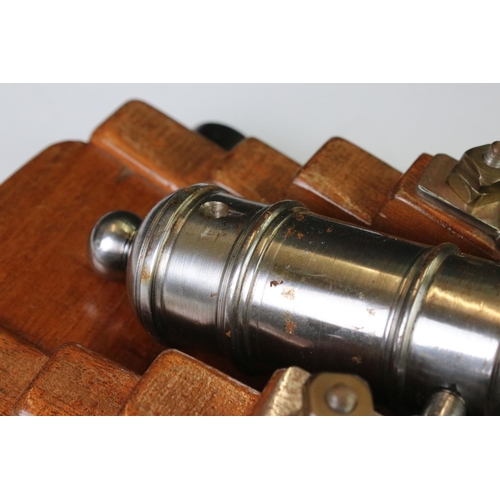 119 - 20th century GWR signal cannon with a steel barrel hinged on an oak carriage, raised on four steel w... 