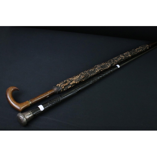 123 - Early-to-mid 20th century ebony shafted walking stick, with silver hallmarked terminal with engraved... 
