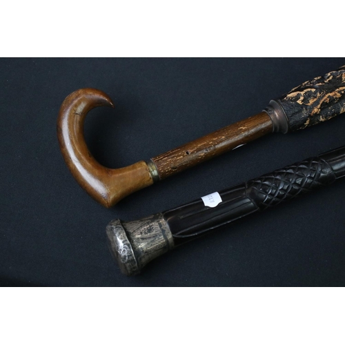 123 - Early-to-mid 20th century ebony shafted walking stick, with silver hallmarked terminal with engraved... 