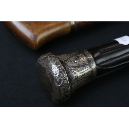 123 - Early-to-mid 20th century ebony shafted walking stick, with silver hallmarked terminal with engraved... 