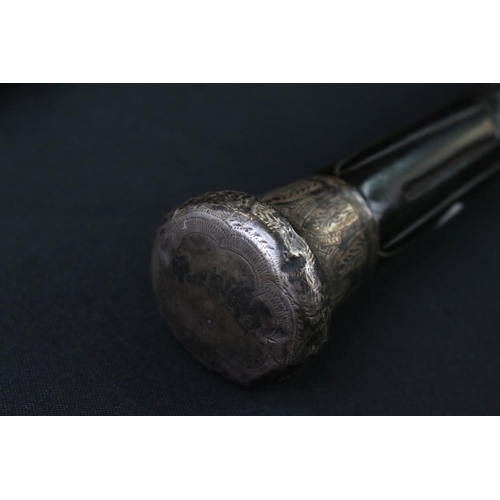 123 - Early-to-mid 20th century ebony shafted walking stick, with silver hallmarked terminal with engraved... 
