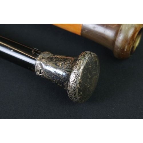 125 - George V ebonised walking stick with silver terminal, London 1923, 92.5cm long, together with a tape... 