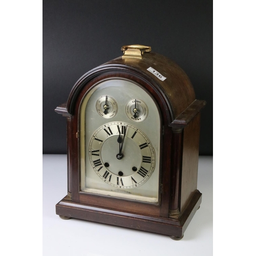 136 - Edwardian mahogany chiming mantle clock with arched silvered dial, poker-style hands, slow/fast and ... 