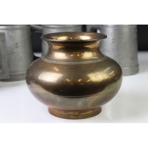 144 - Chinese brass censer of plain polished baluster form, raised on a circular foot, approx 11cm high, t... 
