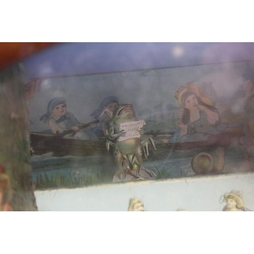 146 - Novelty stained pine music box, with an arched glass panel to the front enclosing a chromolithograph... 
