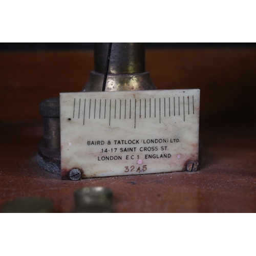 147 - Baird & Tatlock, London set of vintage balance weighing scales housed within a wooden case, with gla... 