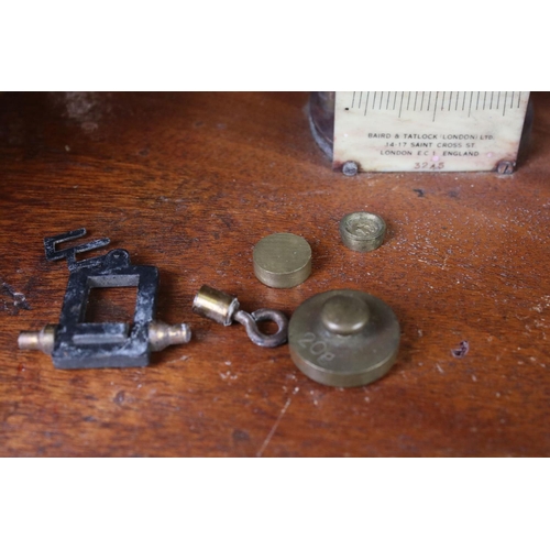 147 - Baird & Tatlock, London set of vintage balance weighing scales housed within a wooden case, with gla... 