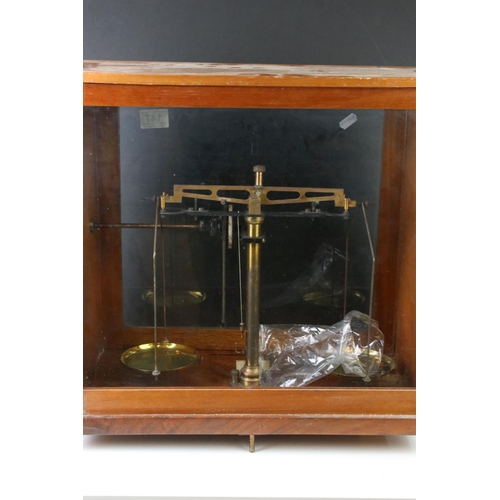 147 - Baird & Tatlock, London set of vintage balance weighing scales housed within a wooden case, with gla... 