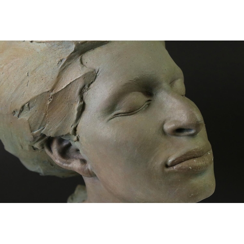 153 - Patinated bust of a woman with her eyes closed, signed Philip Wakeham and dated '94, on a polished s... 