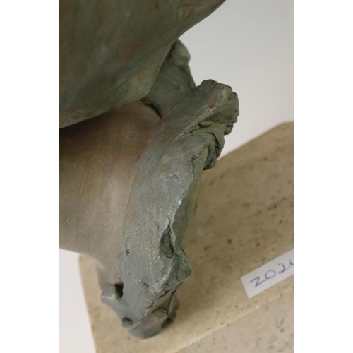 153 - Patinated bust of a woman with her eyes closed, signed Philip Wakeham and dated '94, on a polished s... 