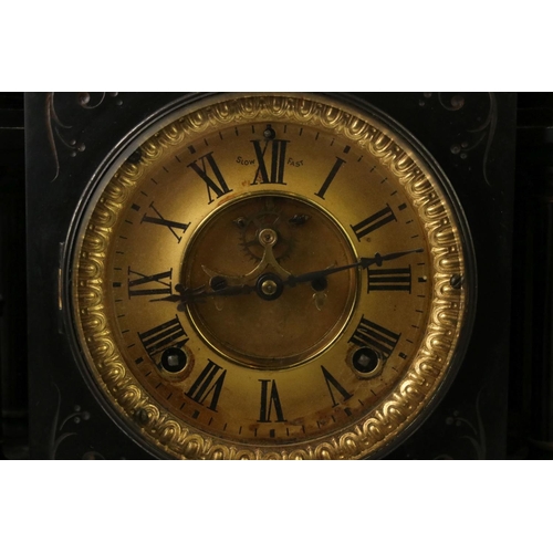 154 - 19th Century slate mantle clock with Roman numerals on a brass dial, flanked by two four-column arch... 