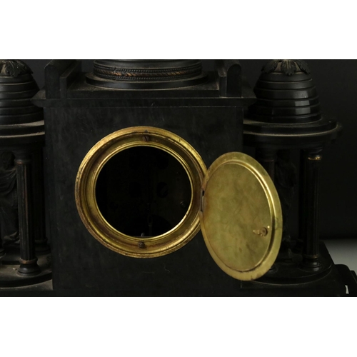 154 - 19th Century slate mantle clock with Roman numerals on a brass dial, flanked by two four-column arch... 