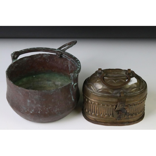 156 - Indian brass cricket box of oval form, with gadrooned sides, domed lid, carry handle and pierced bas... 