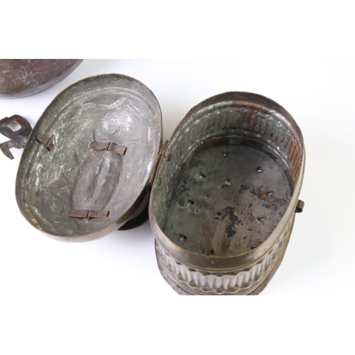 156 - Indian brass cricket box of oval form, with gadrooned sides, domed lid, carry handle and pierced bas... 