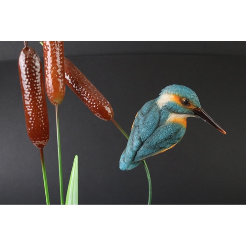 157 - Cast metal and resin figure of a Kingfisher perched on a Bullrush, raised on a circular base, approx... 