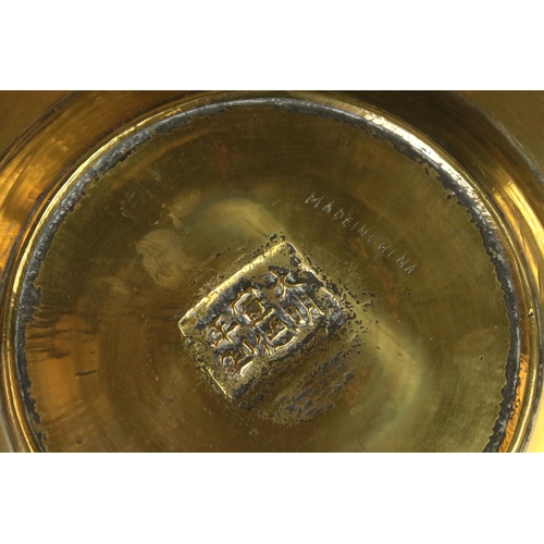 158 - Set of three Chinese brass plates with engraved dragon and Greek key-style decoration, comprising a ... 