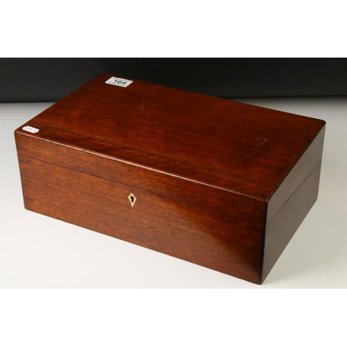 164 - Victorian mahogany writing slope with fitted felt-lined slope, brass lidded inkwell,  various intern... 