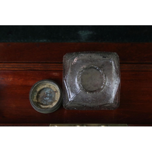 164 - Victorian mahogany writing slope with fitted felt-lined slope, brass lidded inkwell,  various intern... 