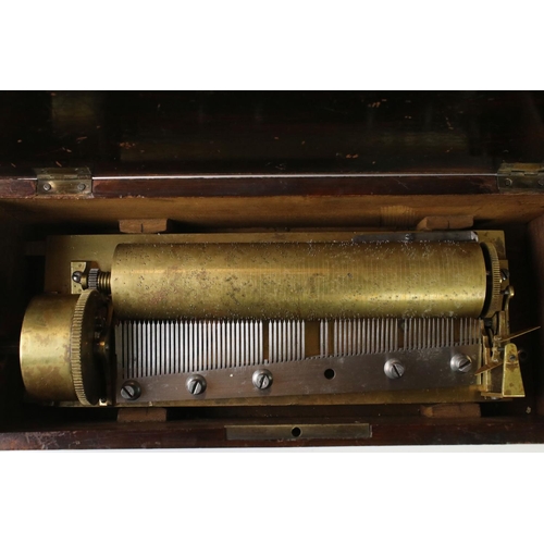 166 - 19th Century Swiss cylinder music box fitted with a one piece comb (missing teeth), 20cm long cylind... 