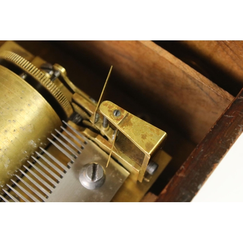 166 - 19th Century Swiss cylinder music box fitted with a one piece comb (missing teeth), 20cm long cylind... 