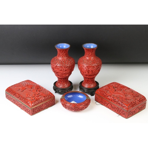 168 - Five pieces of 20th century Chinese cinnabar lacquer ware comprising a pair of baluster vases depict... 