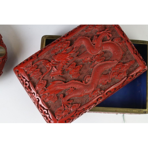 168 - Five pieces of 20th century Chinese cinnabar lacquer ware comprising a pair of baluster vases depict... 