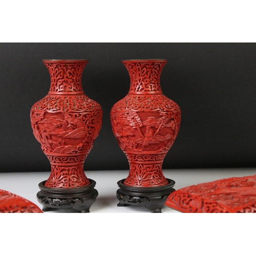 168 - Five pieces of 20th century Chinese cinnabar lacquer ware comprising a pair of baluster vases depict... 