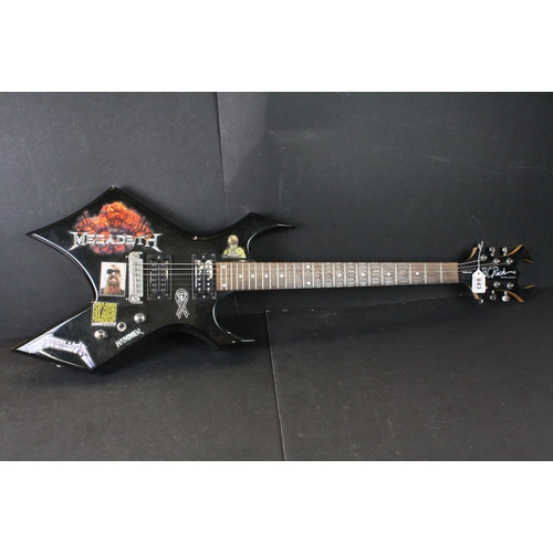 843 - Guitar - B.C. Rich Warlock Bronze Series electric guitar in black.  Various band stickers have been ... 