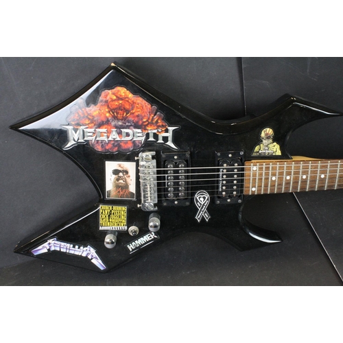 843 - Guitar - B.C. Rich Warlock Bronze Series electric guitar in black.  Various band stickers have been ... 