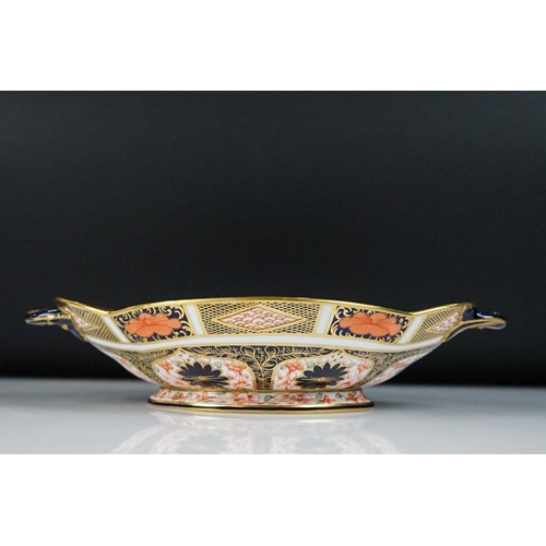 13 - Royal Crown Derby Imari pattern twin-handled footed dish, pattern no. 1128, 27.5cm long, together wi... 
