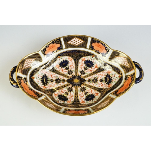 13 - Royal Crown Derby Imari pattern twin-handled footed dish, pattern no. 1128, 27.5cm long, together wi... 