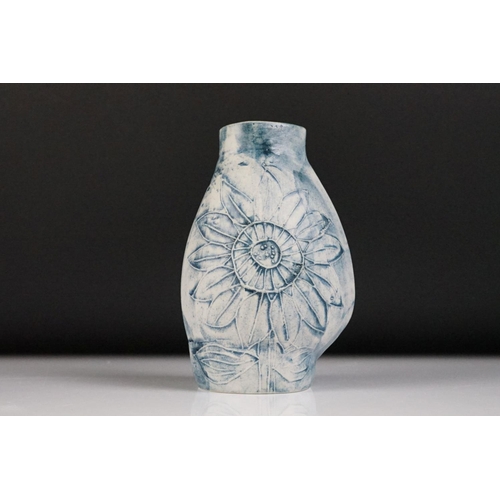 47 - Carn Pottery of Penzance, Cornwall vase of asymmetrical form, with relief tube-lined sunflower decor... 