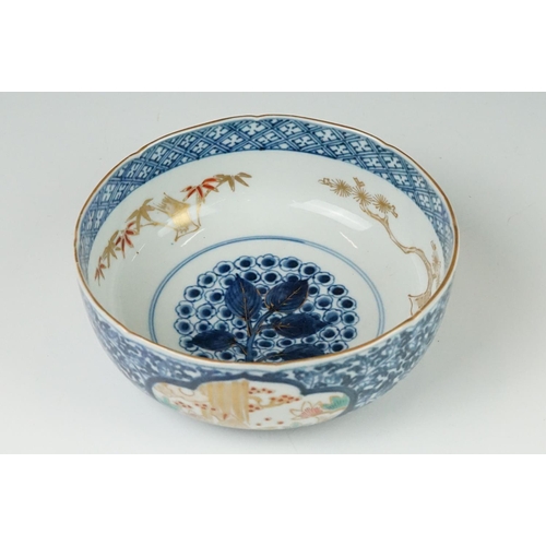 39 - 19th century Japanese Arita Ware Bowl decorated with panels of fish within a river, four character m... 