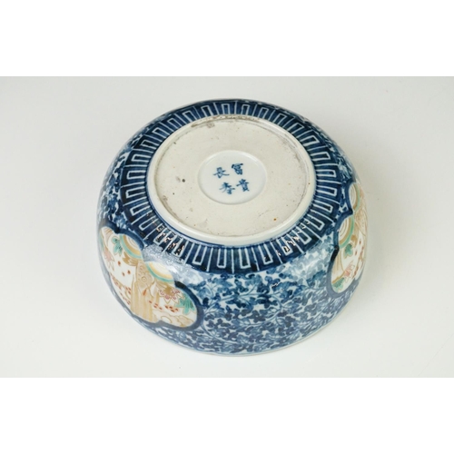 39 - 19th century Japanese Arita Ware Bowl decorated with panels of fish within a river, four character m... 