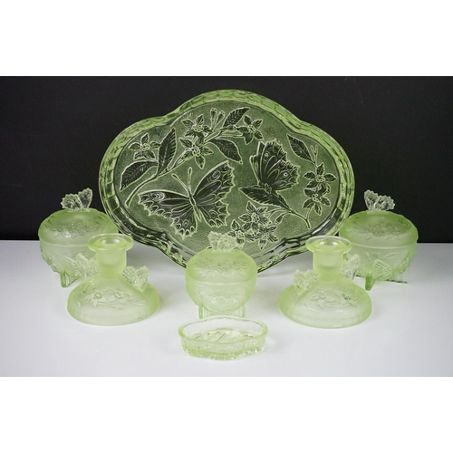 42 - Art Deco Sowerby Green Uranium Glass ' Butterfly ' Dressing Table Set comprising tray, two candlesti... 