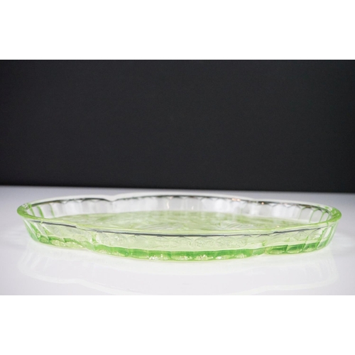 42 - Art Deco Sowerby Green Uranium Glass ' Butterfly ' Dressing Table Set comprising tray, two candlesti... 