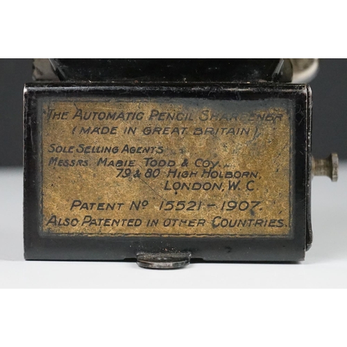 81 - Early 20th century Messrs Mabie Todd & Co ' The Automatic Pencil Sharpener ', 13cm high contained in... 