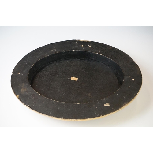 88 - Lacquered Domed Oval Plaque decorated with a Horse and a Dog outside of gates, signed, 32cm long